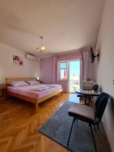 Postel nebo postele na pokoji v ubytování Guest House Pamela