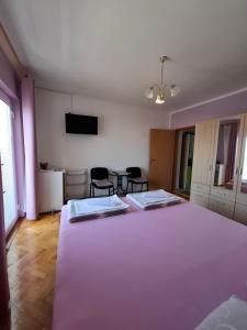 Postel nebo postele na pokoji v ubytování Guest House Pamela