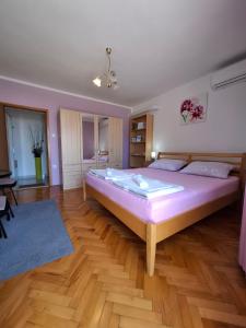 Postel nebo postele na pokoji v ubytování Guest House Pamela