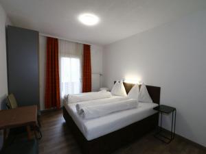 Posteľ alebo postele v izbe v ubytovaní holiday home Bergheim, Fügen