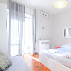 Posteľ alebo postele v izbe v ubytovaní Central Station and City Rooms Link "13 Apartment" Amalfi Coast , Salerno