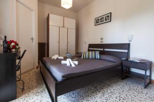 Postel nebo postele na pokoji v ubytování Hotel Graziana