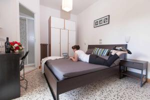Postel nebo postele na pokoji v ubytování Hotel Graziana