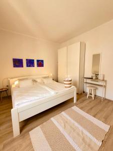 Postel nebo postele na pokoji v ubytování Gradolina Apartment + 27 fotografií