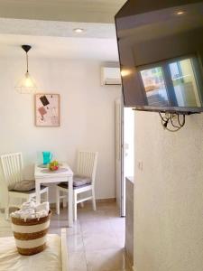 TV a/nebo společenská místnost v ubytování Gradolina Apartment