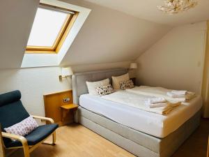 Postel nebo postele na pokoji v ubytování Hotel Hofmann Zur Mühle