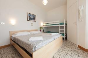 Postel nebo postele na pokoji v ubytování Hotel Graziana + 37 fotografií