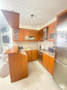 Kuchyň nebo kuchyňský kout v ubytování Cozy home + 3 fotografie