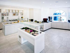 Nhà bếp/bếp nhỏ tại Theo Bungalows Boutique Hotel
