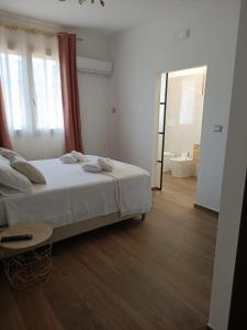 Postel nebo postele na pokoji v ubytování B&B Eterea