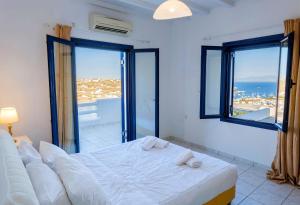 Ένα ή περισσότερα κρεβάτια σε δωμάτιο στο Villa Korfos Breeze +20 φωτογραφίες