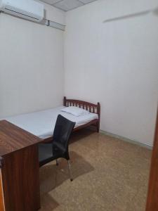 Postel nebo postele na pokoji v ubytování Rooms TRA Mahal