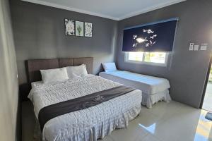 Postel nebo postele na pokoji v ubytování Casa Blu Hotel & Resort + 24 fotografií