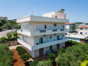 an overhead view of a white building with trees at Villa Abiori 2 in Ksamil