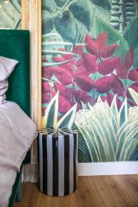 Postel nebo postele na pokoji v ubytování MUZE Hotel Utrecht