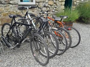 a group of bikes parked next to a building at St Mullins Glamping Hut,R95T3CT in Saint Mullins