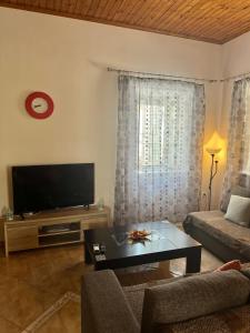 TV a/nebo společenská místnost v ubytování Todos home