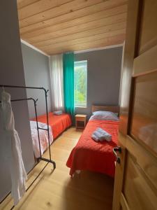 Postel nebo postele na pokoji v ubytování Guest House pesvebi + 37 fotografií