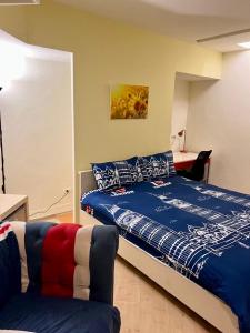 Postel nebo postele na pokoji v ubytování Zhongshan 19