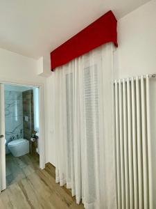 Postel nebo postele na pokoji v ubytování ARBI VENICE STATiON