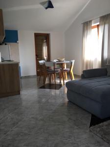 Kuchyň nebo kuchyňský kout v ubytování Orange&Blue Apartments