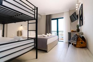 Postel nebo postele na pokoji v ubytování Samel Hotel