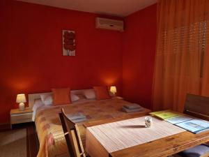 Postel nebo postele na pokoji v ubytování Villa Luketa