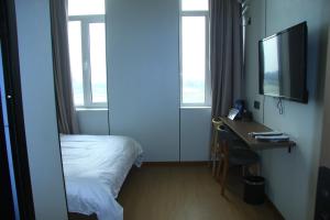 TV o dispositivi per l'intrattenimento presso 合悦精品商务酒店