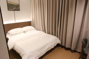 Letto o letti in una camera di 合悦精品商务酒店