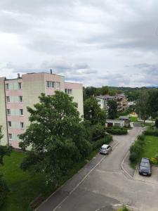 a view of a street in a city with a building at Mieszkanie Jelenia in Jelenia Góra