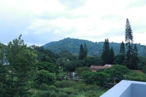 a view of the mountains from a house at Bio Villas Resorts in Yelagiri