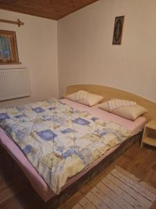 Postel nebo postele na pokoji v ubytování Chata Mária