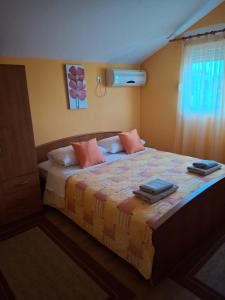 Postel nebo postele na pokoji v ubytování Villa Luketa