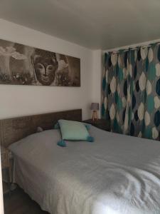 Llit o llits en una habitació de KAY LA DOUCE villa 4 chambres piscine à 200m de la plage