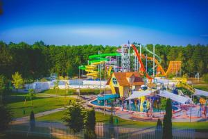 a large amusement park with a roller coaster at Delfin Apartman Zalakaros in Zalakaros