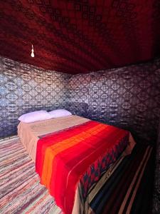 Postel nebo postele na pokoji v ubytování Merzouga Camping Trek