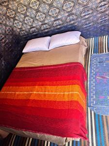 Postel nebo postele na pokoji v ubytování Merzouga Camping Trek
