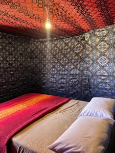 Postel nebo postele na pokoji v ubytování Merzouga Camping Trek