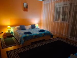 Postel nebo postele na pokoji v ubytování Villa Luketa