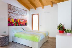 Postel nebo postele na pokoji v ubytování Agriturismo Vin e Amor