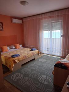 Postel nebo postele na pokoji v ubytování Villa Luketa
