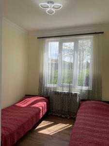 Postel nebo postele na pokoji v ubytování Holiday
