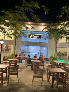 Restaurace v ubytování شاليه بالساحل الشمالي باكوا فيو