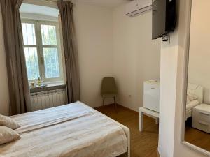 Postel nebo postele na pokoji v ubytování Villa Milada