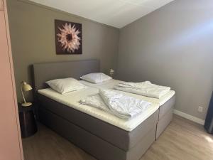 เตียงในห้องที่ Vakantiehuis Lemmer aan het water