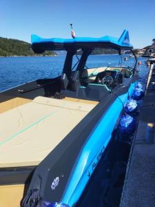 a boat is docked in a body of water at Raptor in Dubrovnik