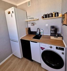 Кухня или мини-кухня в Apartament Morski

