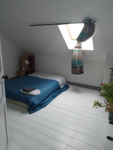 Postel nebo postele na pokoji v ubytování Appartement dans une maison privée