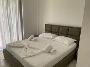 Postel nebo postele na pokoji v ubytování Hotel Dini