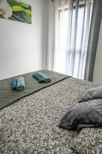 Ένα ή περισσότερα κρεβάτια σε δωμάτιο στο AbraCadabra Flat France Suisse